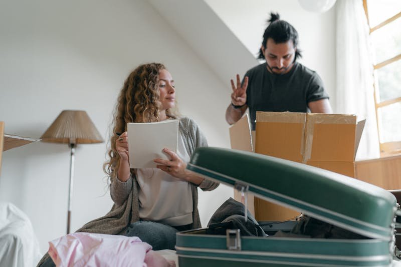 Professional movers carefully moving furniture